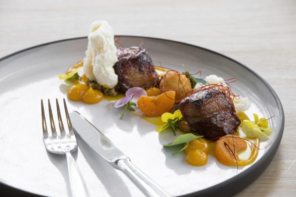 LR Cavalli dish by Michael Deg_slow-cooked pork cheek, cooked in master stock, pickled naartjie, chili, pesto, goats cheese croquette, crackling copy Indulge